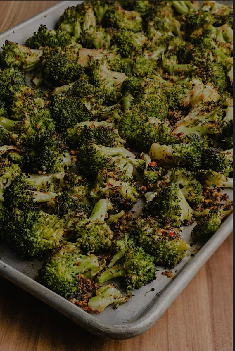 Bake broccoli 1: Microwave steam frozen broccoli 7-8 mintues
2: Spread broccoli on baking sheet with olive oil salt and pepper
3: Bake at 450° for 20 mintues
4: Mix and switch to broil until brown (5-10 mintues)