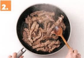Cook Beef
- In a large frying pan, heat a drizzle of olive oil over high heat.
- When oil is hot, cook beef strips, in batches, until browned and cooked through, 1-2 mins.
- Transfer to a bowl, season and set aside.