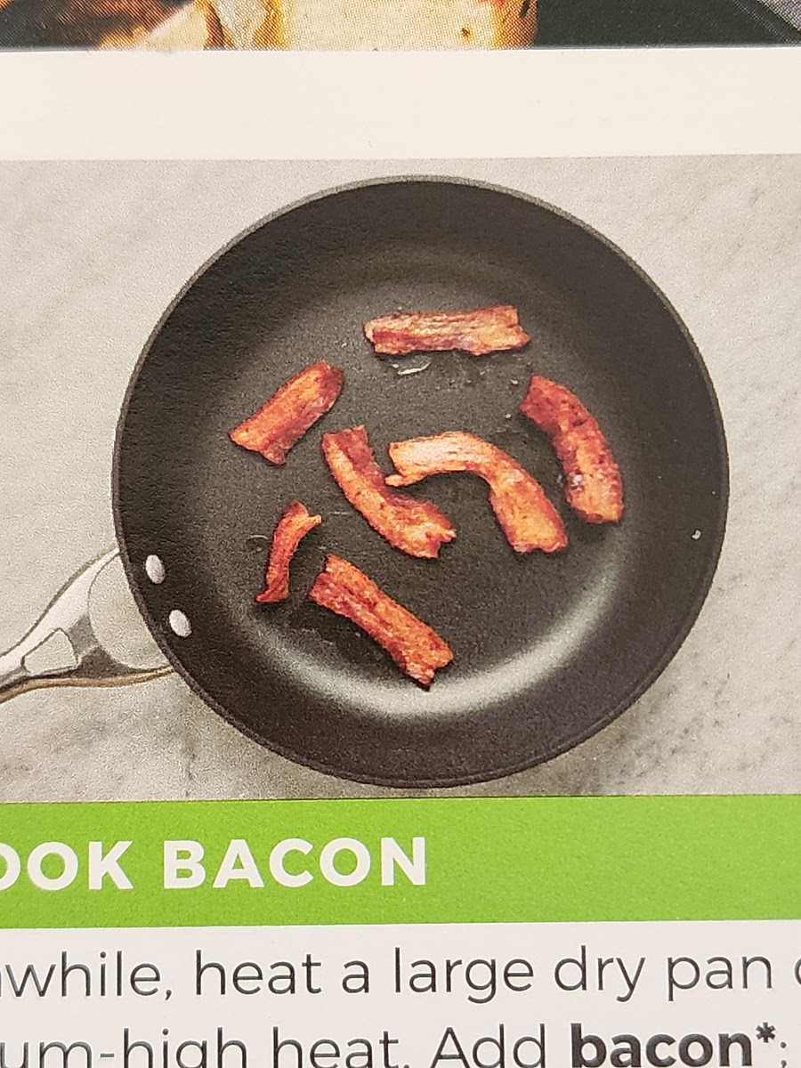 Transfer bacon to paper towel-lined plate. Reserve 1 Tbsp bacon fat. Once bacon has cooled to the touch, roughly chop.