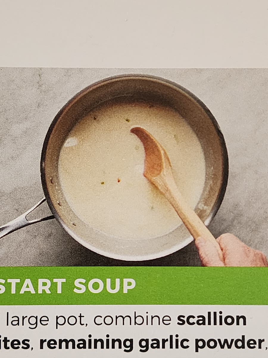 In a large pot, combine remaining garlic powder, reserved bacon fat, 1 Tbsp butter (and scallion whites, if using) over medium-high heat. Cook and stir one minute.