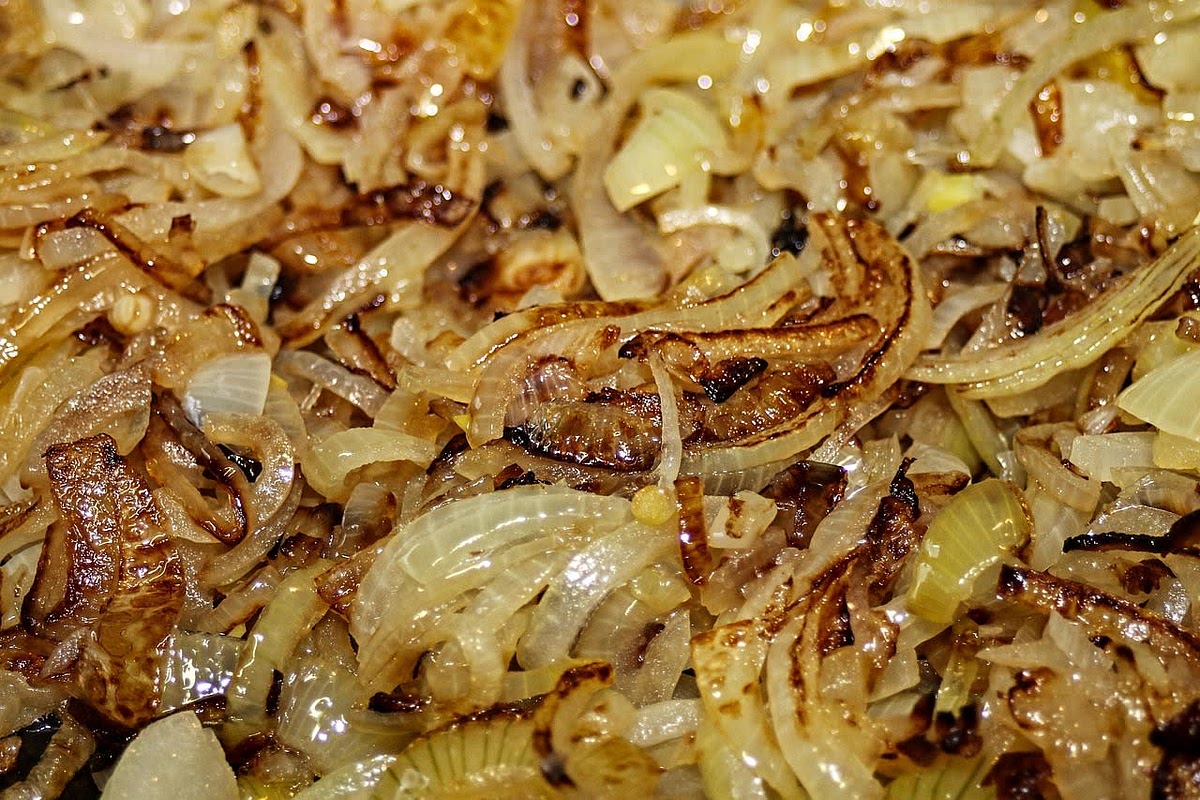 Add the onions and stir to combine flavors and until the onions begin to caramelize