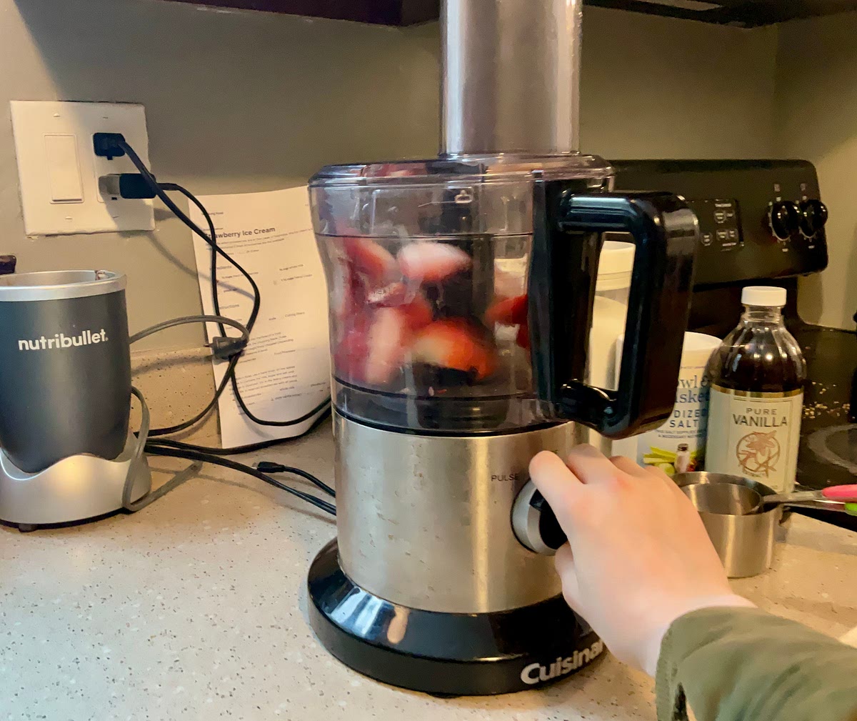 Put the strawberries into the bowl of a food
processor fitted with the chopping blade. Pulse
strawberries until rough/finely chopped (depending
on preference). Reserve in bowl.