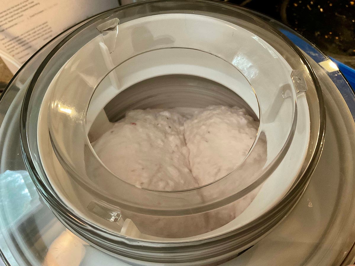 Turn on your ice cream maker; pour the
mixture into the frozen freezer bowl and let mix until
thickened, about 15 to 20 minutes.