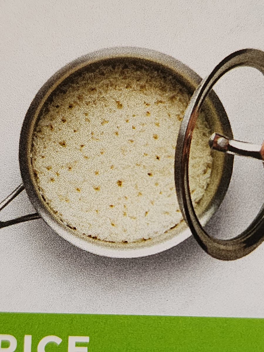 Cook rice in rice cooker according to label directions.