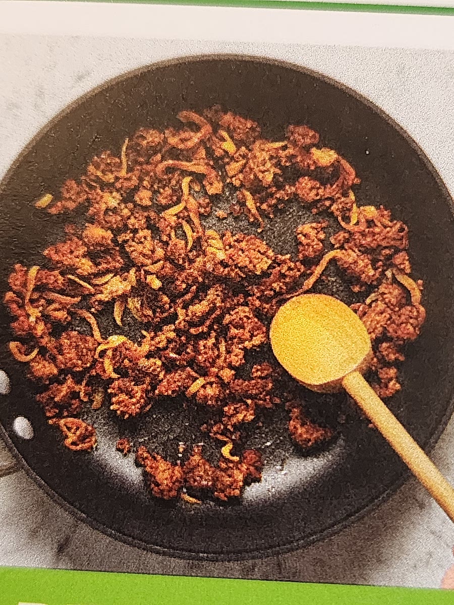 Stir tomato paste and stock concentrate in to pan with beef, then add water. Cook until slightly thickened, 1-2 minutes. Stir in half the butter until melted.