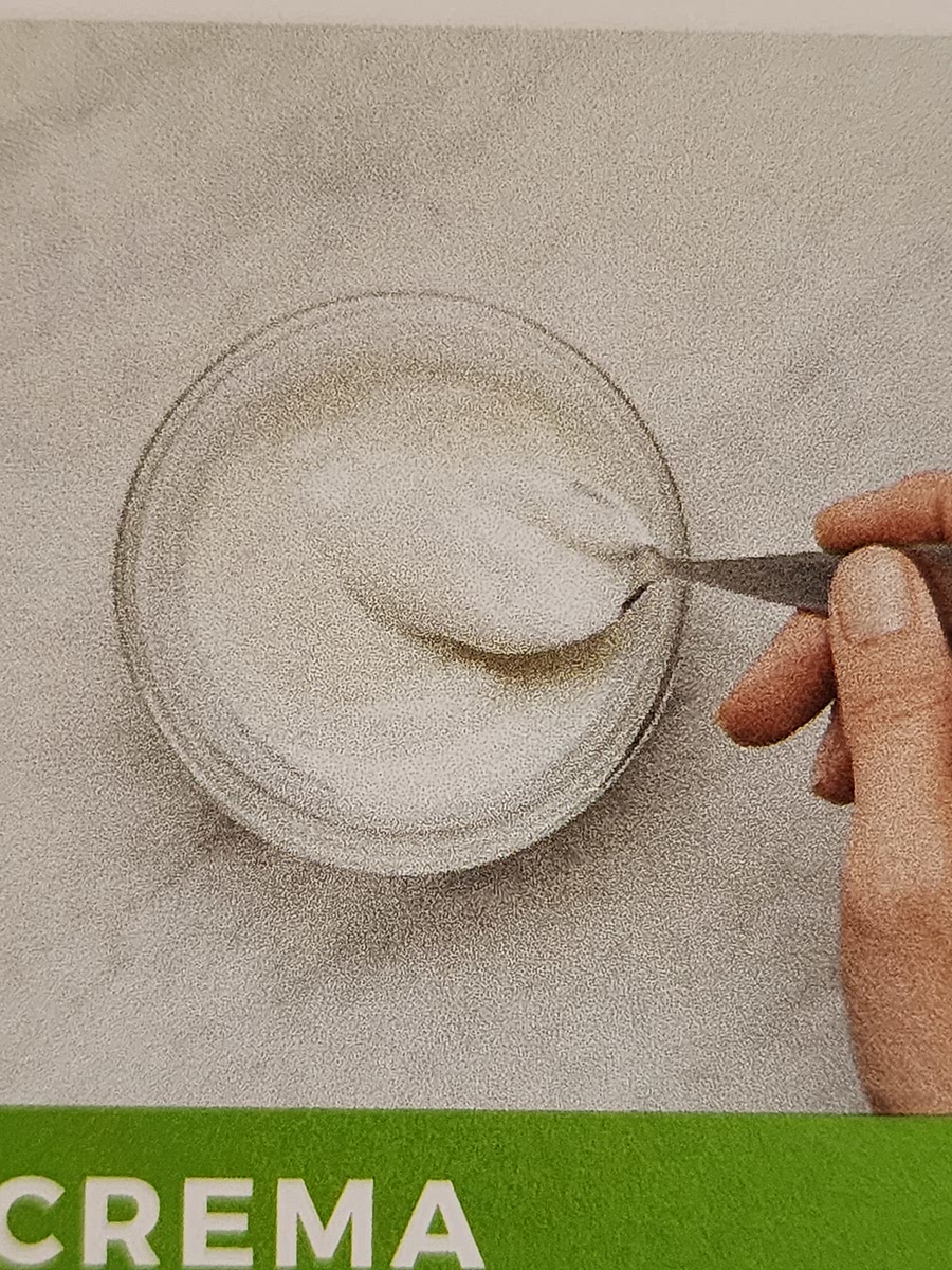 In a small bowl, combine sour cream with a squeeze of lime juice. Season with salt and pepper. Add water, 1 Tbsp at a time, til mixture is drizzling consistency.