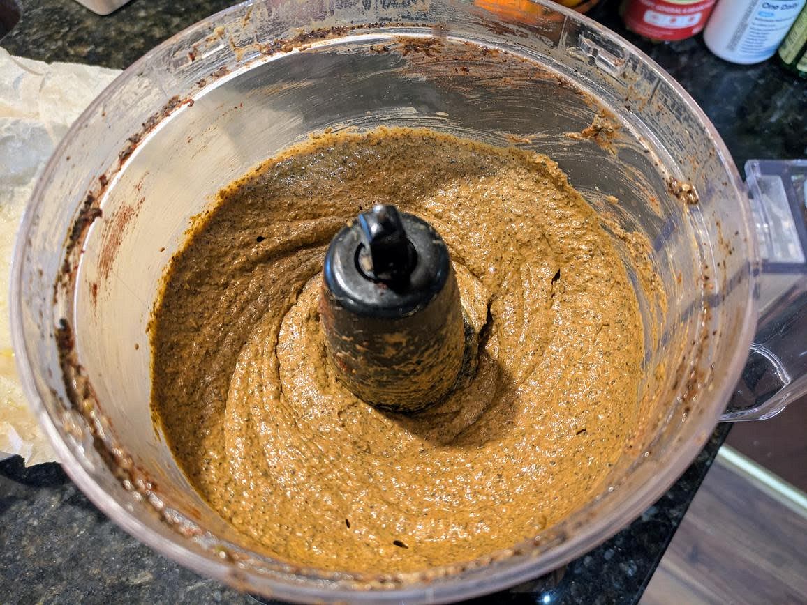 Drain and rinse your beans. Add all ingredients to a food processor, and blend until smooth. Blend in the baking soda last. As soon as the baking soda interacts with the vinegar, the reaction to rise the cake will begin, so adding it as late as possible helps to get more optimal lift (am I really giving proper cake baking instructions when there's sauerkraut, coffee, and ginger in here??)