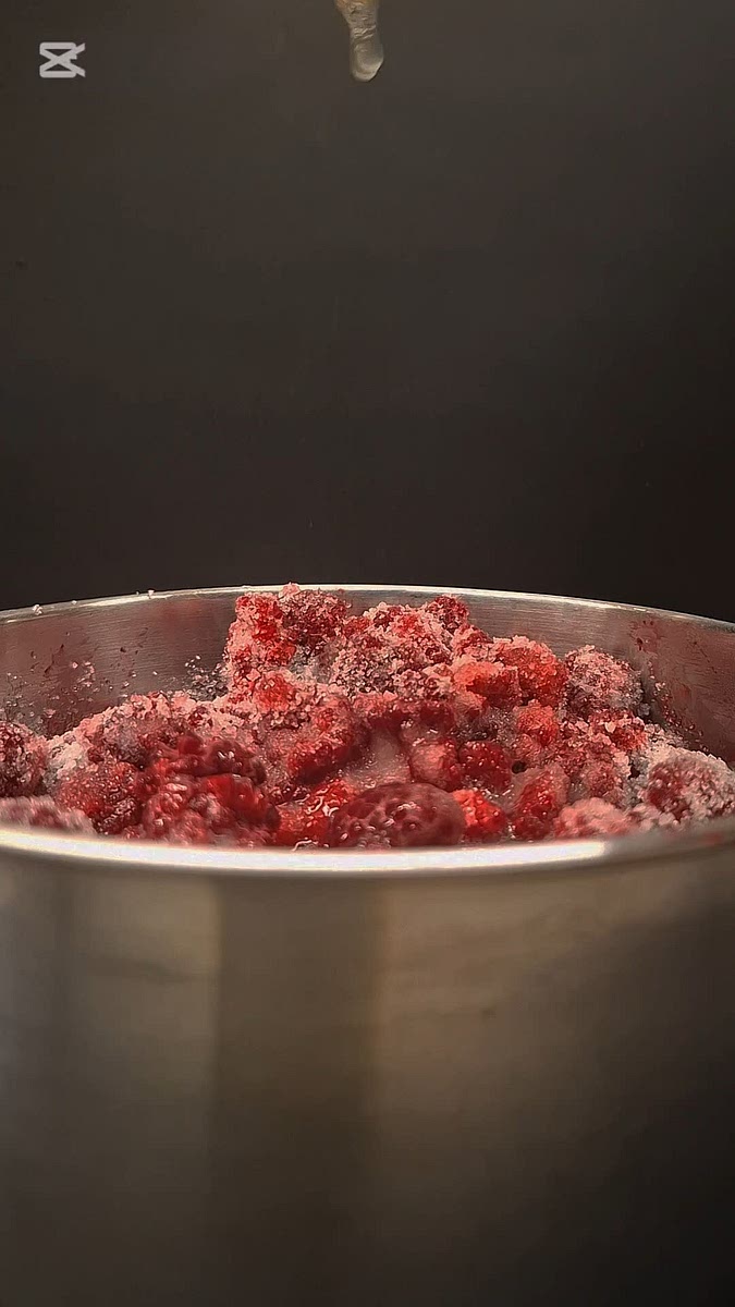 In a pot add the frozen raspberries along with sugar, lemon juice and water.