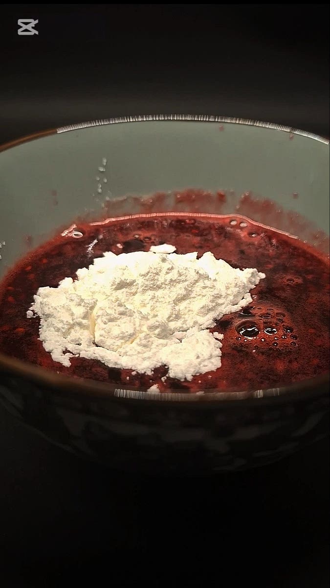 In a small bowl add 8-9 tbsp of the raspberry juice while it's still boiling and mix in the cornstarch.