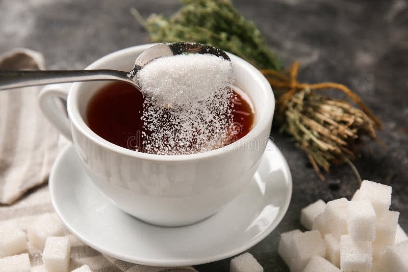 Add sugar while still hot and stir until dissolved.