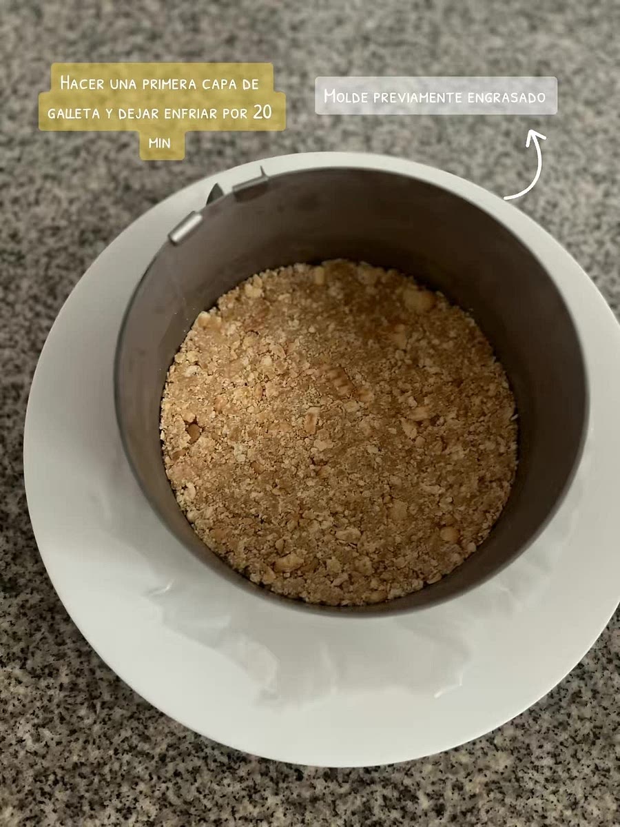 1. place the cookies into a large ziplock bag and crush the crackers with a rolling pin. mix the cookies with the milk .Scoop the mix into the prepared cake pan. Press firmly