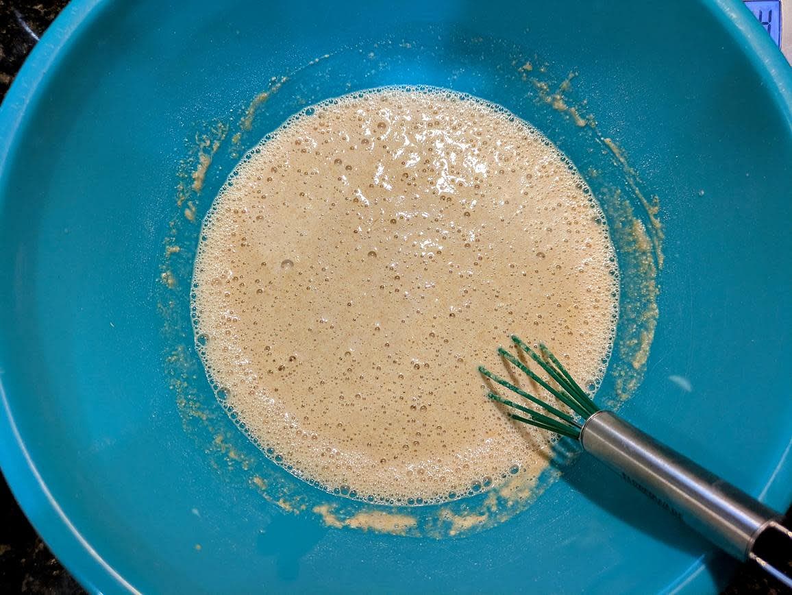 Add in the wet ingredients - hot honey, apple cider vinegar, and water. Whisk until smooth. If you don't have hot honey, you can replace it with regular honey, and add 1 tsp (2 g) red pepper flakes