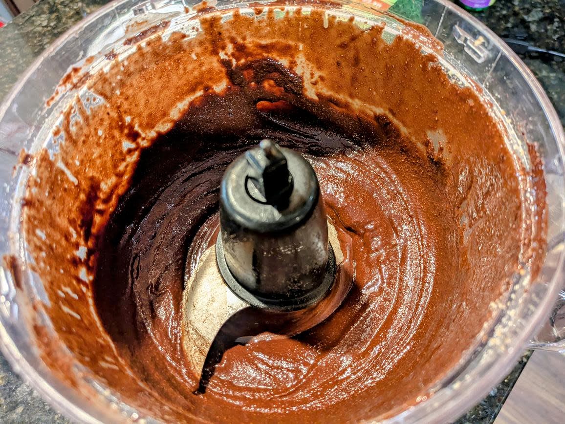 Only once your hazelnut butter is fully made, blend in the rest of the ingredients - bananas, carob (or cocoa), vanilla, and salt. Blend until smooth and thin out with applesauce until you have a spreadable texture. Add any sweetener to taste (if desired). Transfer across 2 small mason jars, and store in the fridge