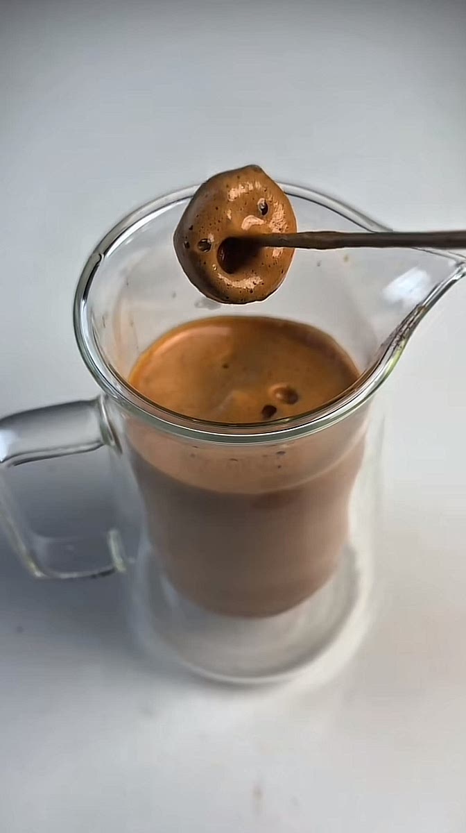 Froth the mixture until light brown and volume doubles