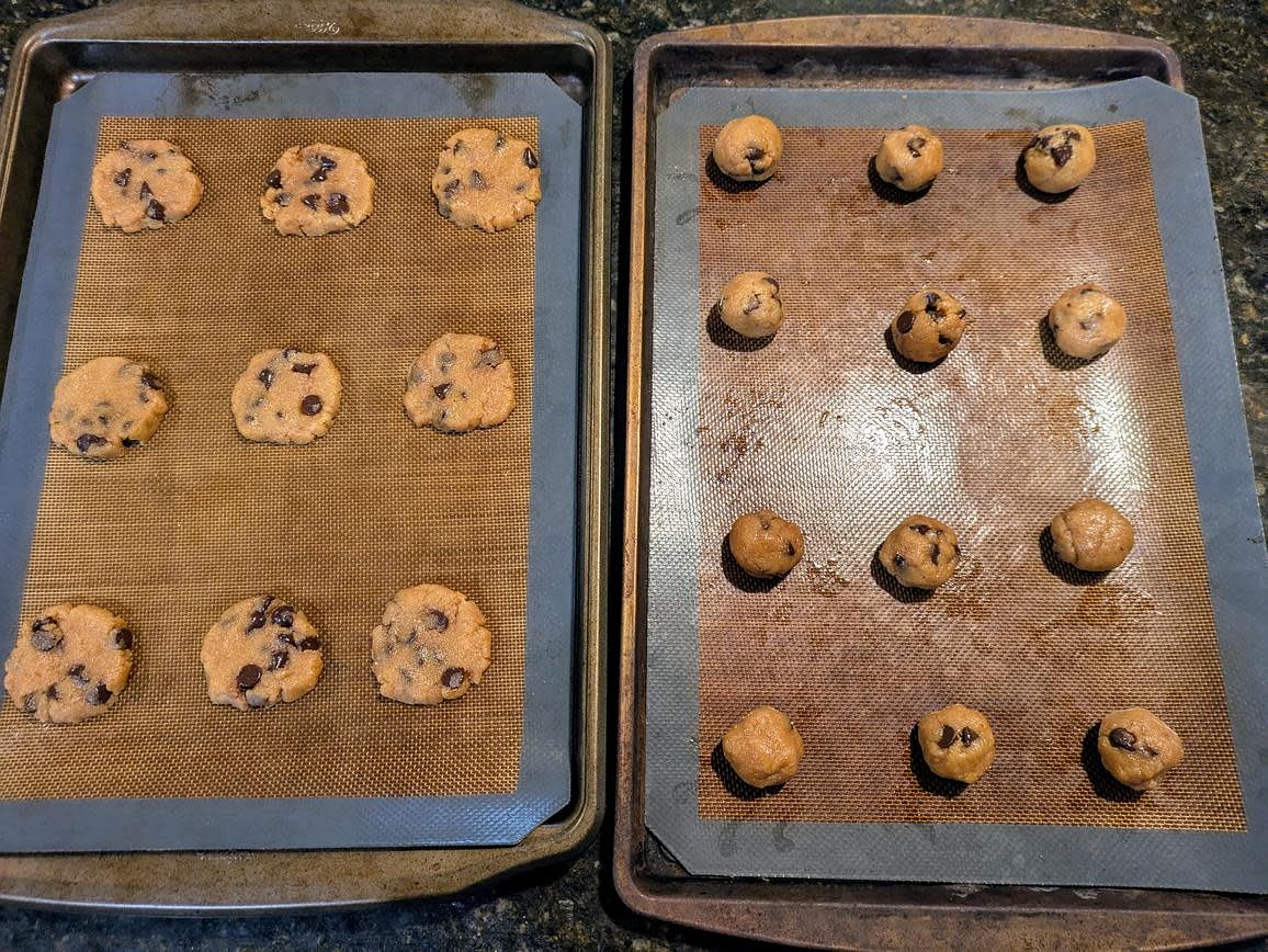 Scoop the cookies into 22 cookie dough balls, about 22 g each. Roll them in your hands, and place onto a parchment lined cookie sheet. Press down to your desired thickness, and shape into a circle. These will puff up and expand just slightly when cooking