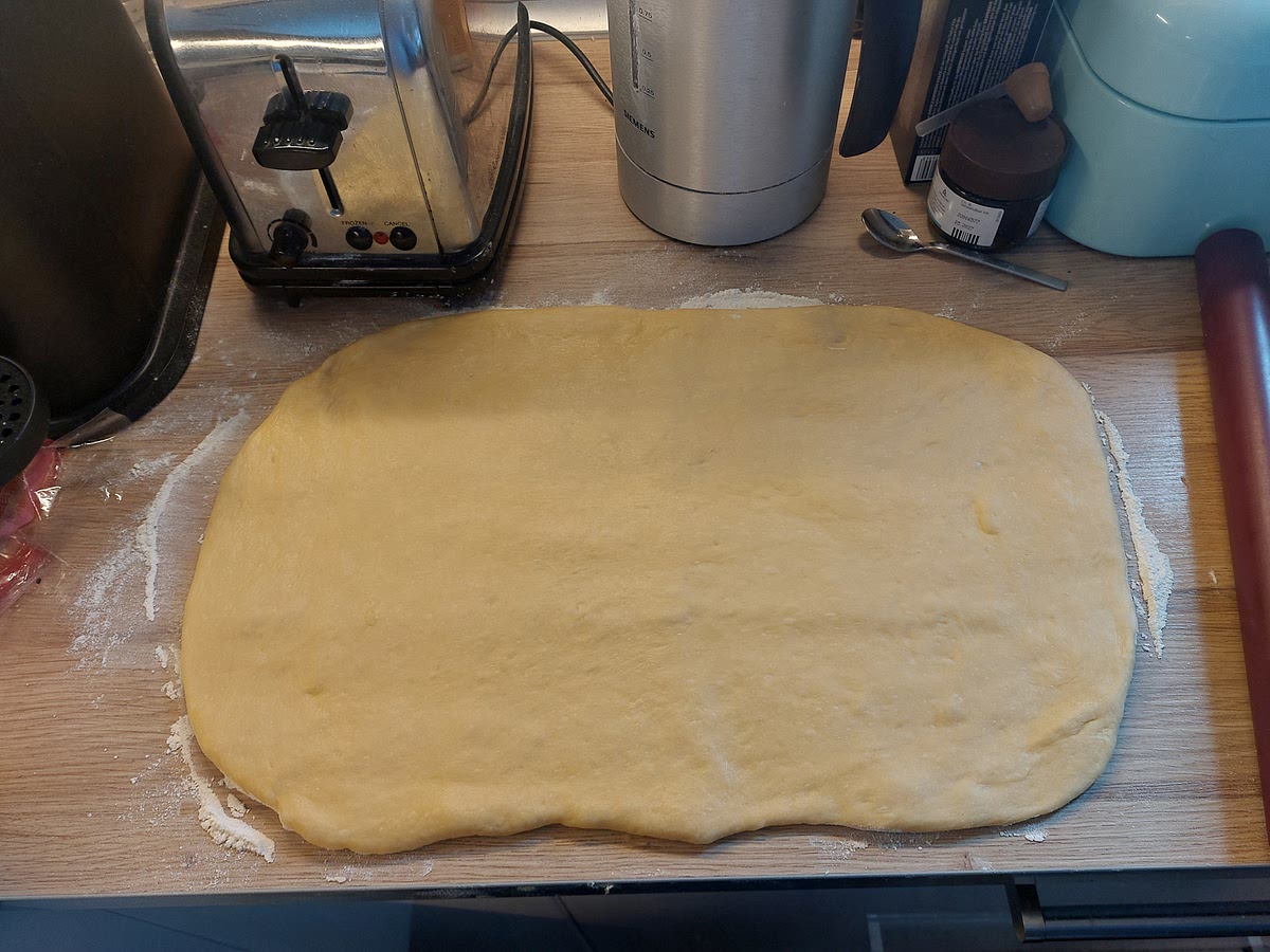 Zeig zu einem etwa 40 x 30 cm Rechteck ausrollen