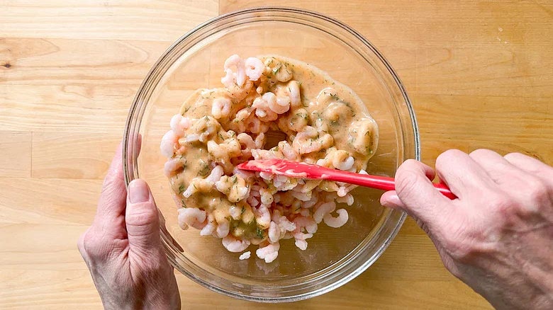 Add ⅔ cup of the mayonnaise dressing to the shrimp and gently toss to combine. Reserve the remaining dressing.