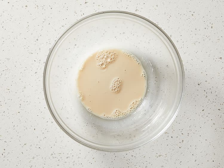 To make the bread: Stir warm water and yeast together in a large bowl; let stand until yeast softens and begins to form a creamy foam, about 5 minutes.