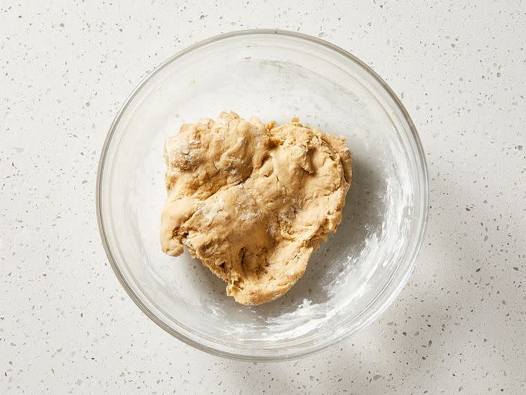 Gradually mix in remaining 2 cups flour and cinnamon until dough comes together.