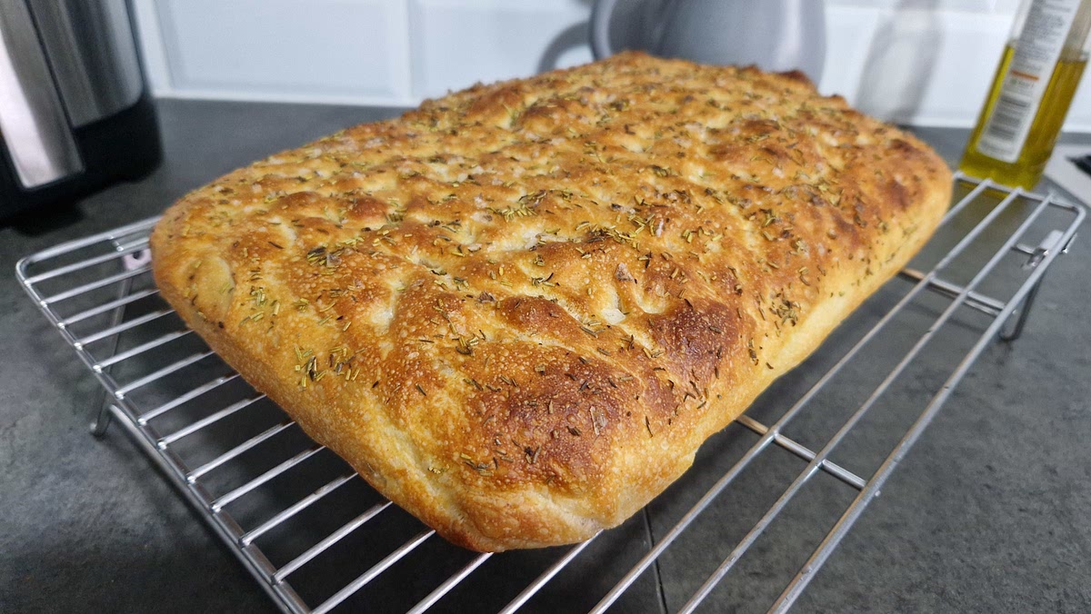 Once cooked, take the bread out of the baking sheet and place on a cooling rack. This will prevent a soggy bottom from any oil residue.