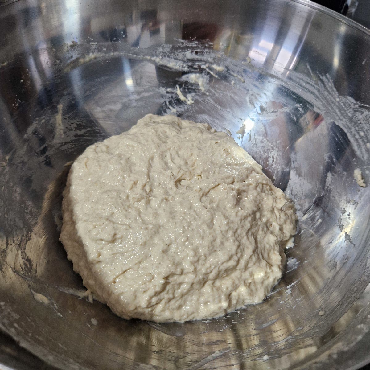 Use a wooden spoon to mix the ingredients together until fully hydrated. The mixture should be sticky.