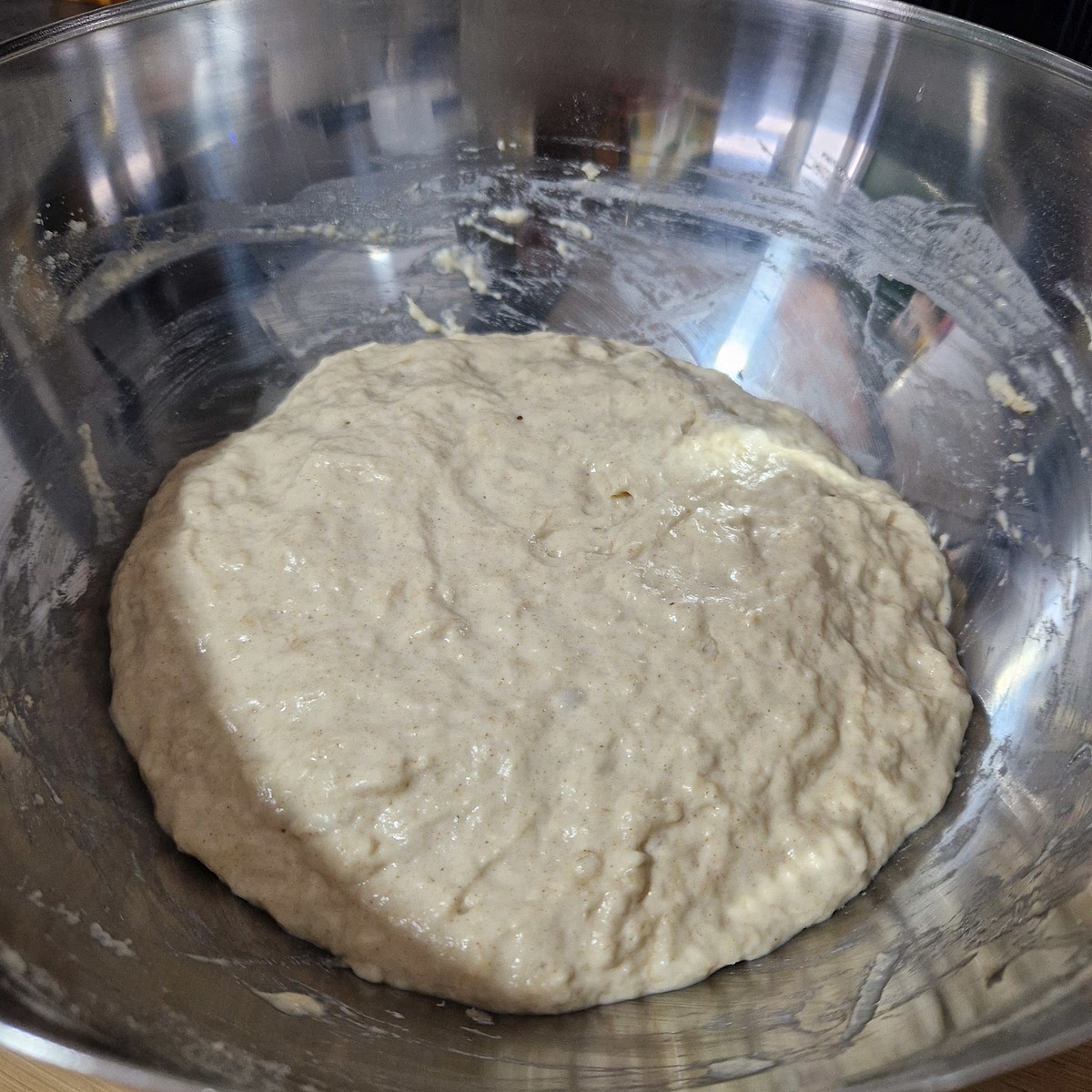 Scrape down the side of the bowl. Cover the bowl and set aside for 10 minutes. The dough should have raised slightly.