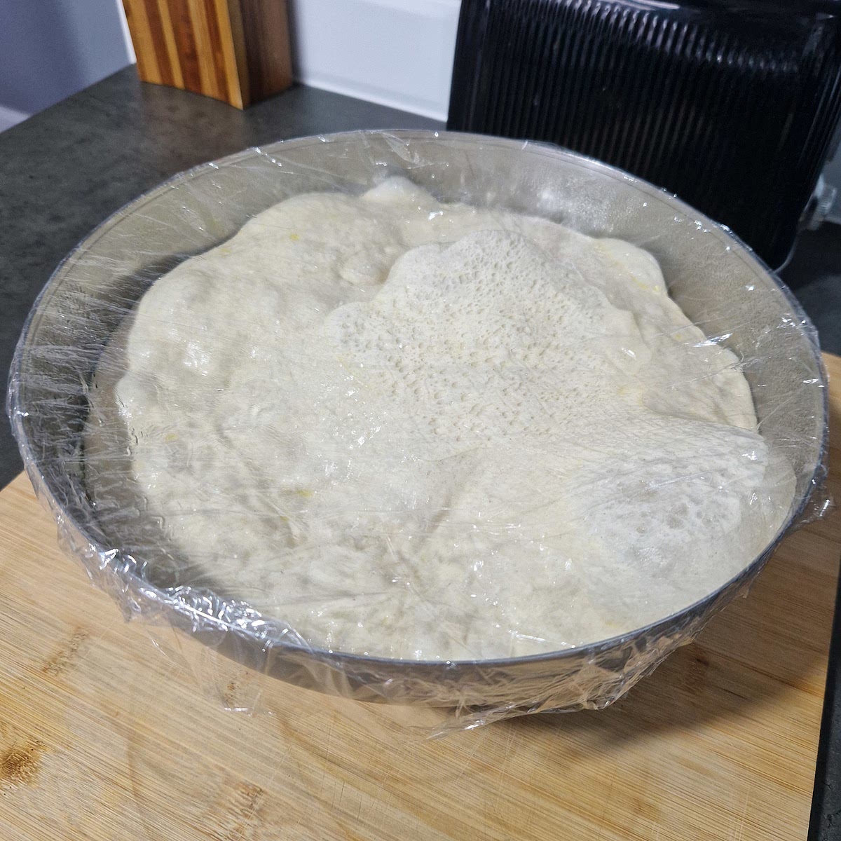 Remove the bowl from the fridge. The dough should have doubled in size.