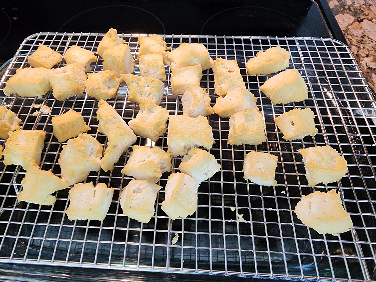 Drain, press and dry tofu. Convection bake on a wire rack at 400 for 20-25 mins until golden brown. Note: it just needs to be dry, not necessarily crispy.