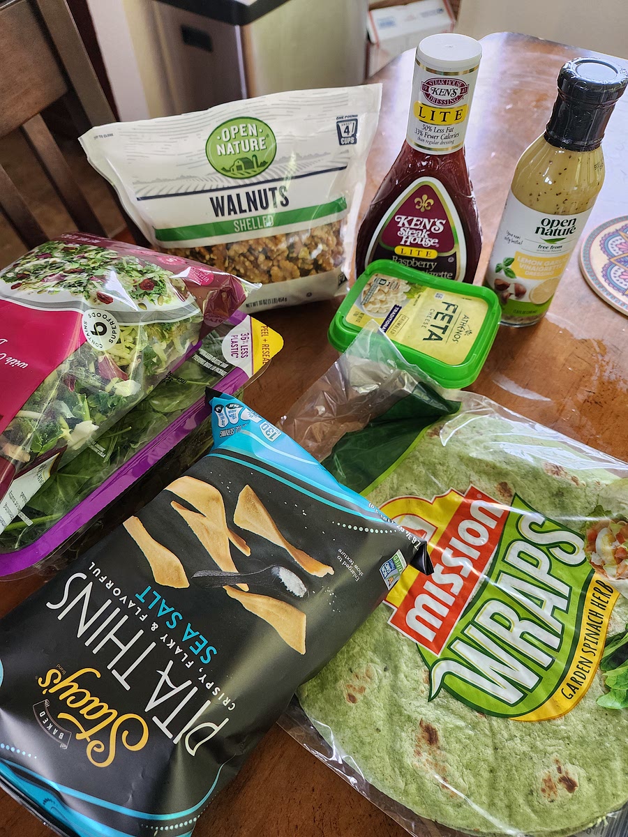 In the meantime, prep all ingredients. Set wraps, dill, lemon vin dressing, and pita chips aside- they will be used at the end. Mix other ingredients into a LARGE bowl.