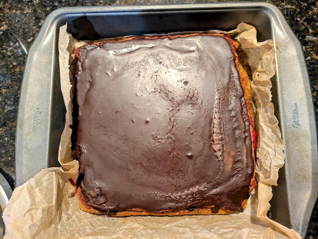 The next day, remove from the pan, and transfer to a wire rack with the red side up. Melt half your coconut oil in the microwave, and stir in half the cocoa powder and half the monk fruit until smooth. Evenly spread across the red layer. Refrigerate for at least 30 minutes to harden the chocolate. Flip over, and repeat with the other half of the chocolate on the green layer. Alternatively, you can use 1 cup (180 g) sugar free chocolate chips instead of homemade chocolate (1/2 cup, 90 g per layer)