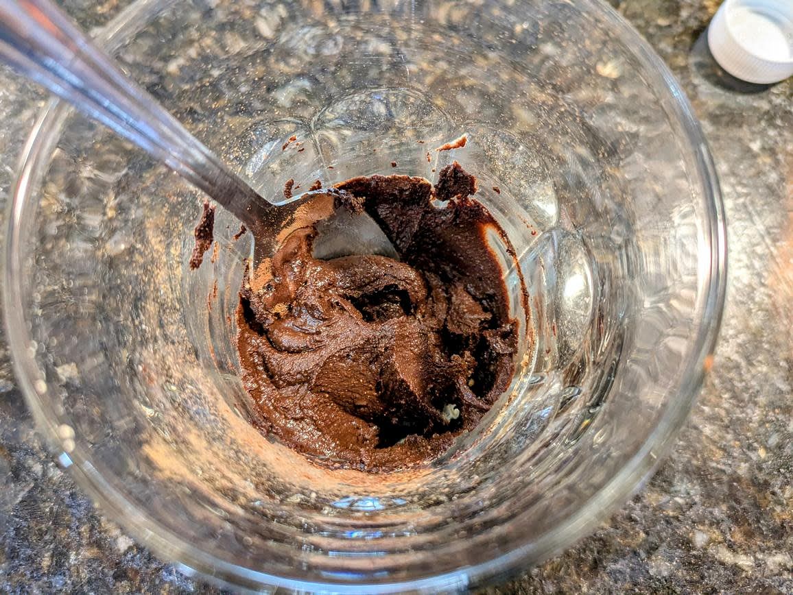 Mix all ingredients together in a small bowl or glass. Use as any other chocolate spread or peanut butter