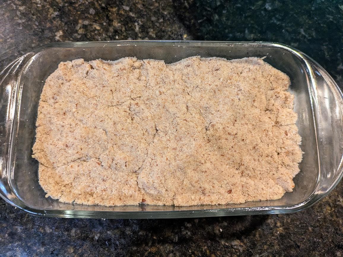 Transfer the dough to the loaf pan and firmly press down
