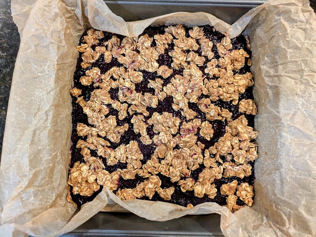Crumble the rest of the oatmeal mixture on top of the jam, and lightly press down
