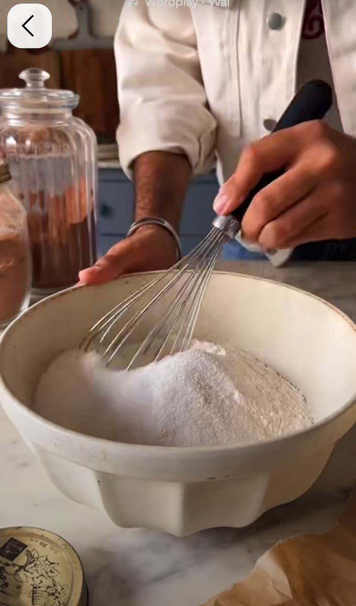 Add your flour to a bowl with the yeast and sugar together and mix