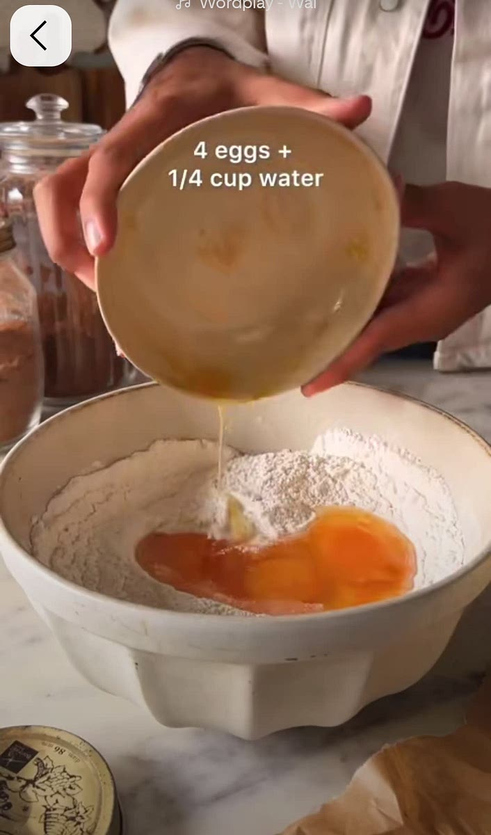Add 4 eggs mixed with the water into your bowl mixture