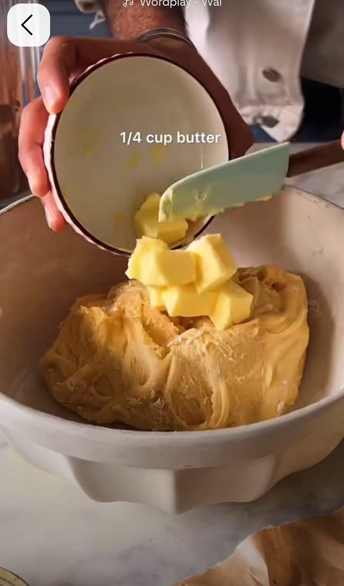 Add your butter to the dough and kneed