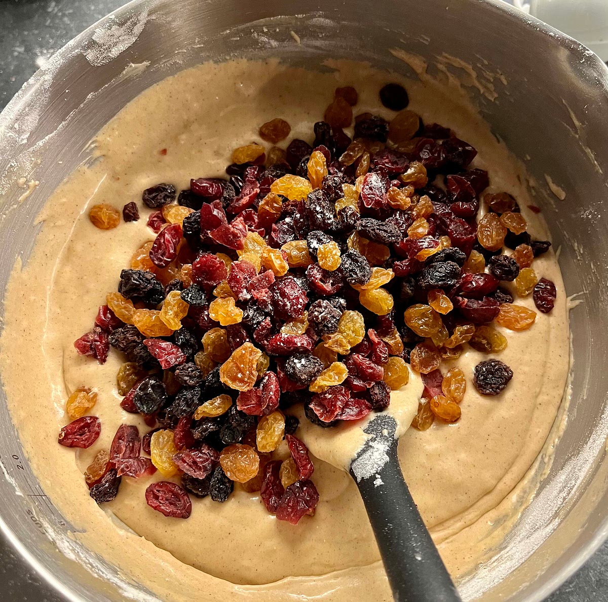 Stir in the raisins, sultanas and cranberries, then add and stir in the rolled oats.