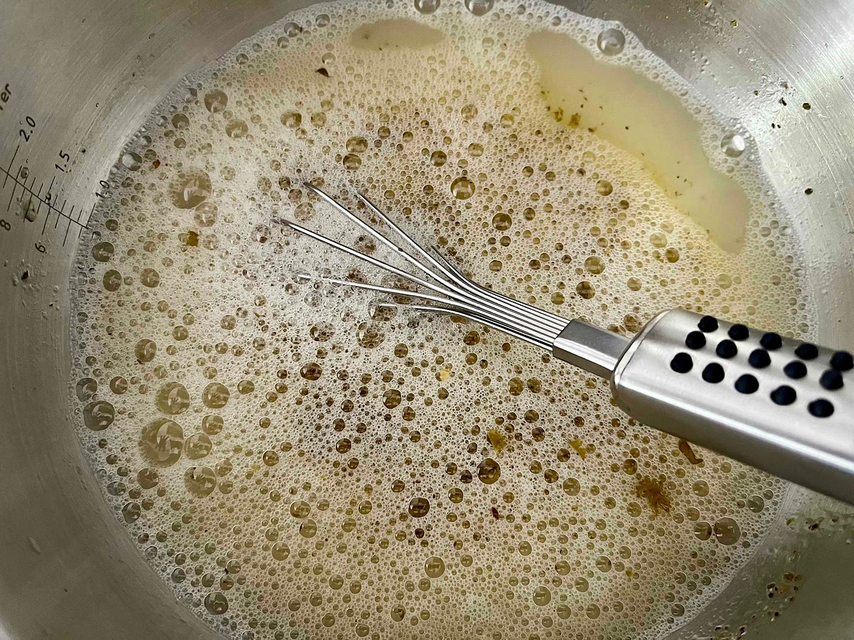 In a large bowl add the water, salt, chimichurri, freshly ground toasted black pepper (if using) and egg, and mix well with a whisk.