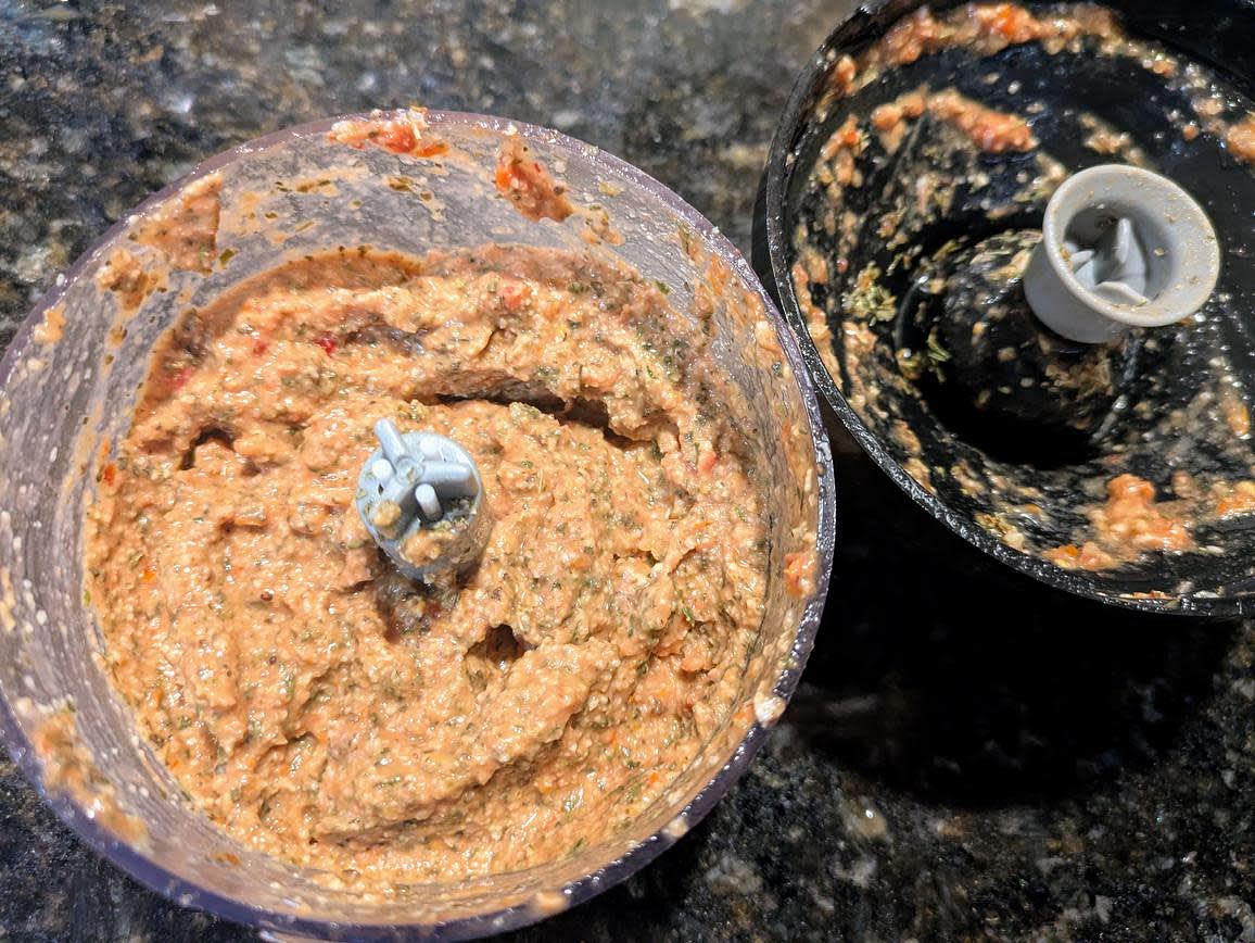 Soak the sun dried tomatoes and cashews in warm water for 10 minutes. Add all ingredients to a blender or food processor, and blend until smooth