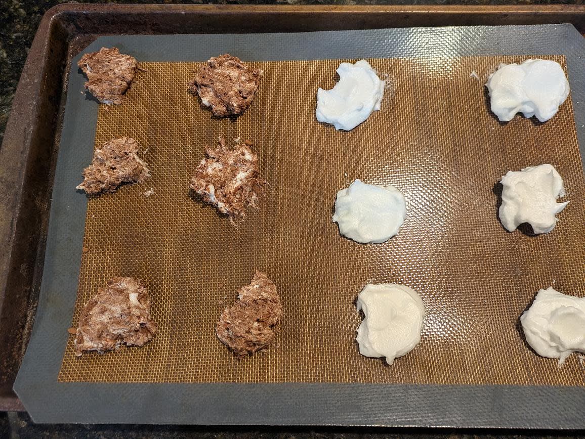 Use a spoon to dollop the cookies onto the tray
