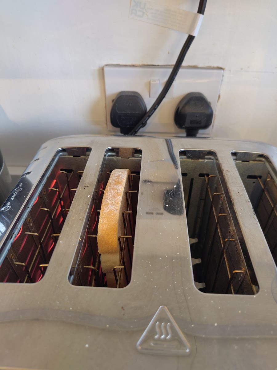 Toast a slice of bread. Butter it.
