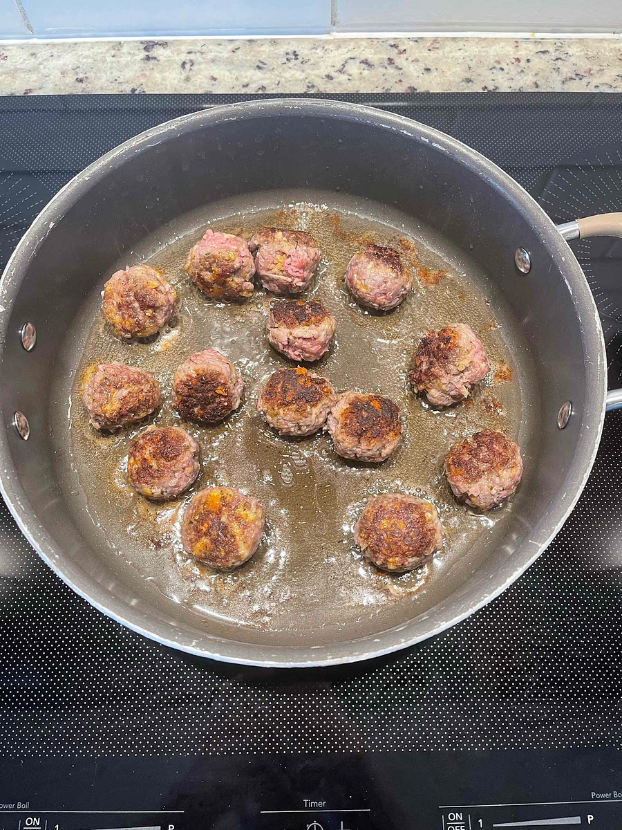 Sear the meatballs on 2-4 sides.