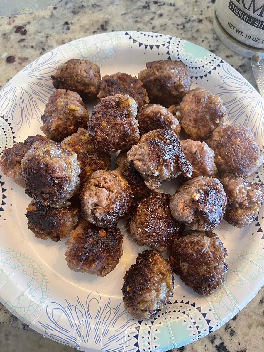 Remove the meatballs and set the heat to LOW.