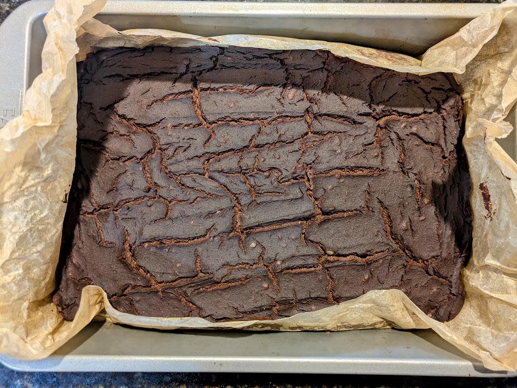 Bake at 350F for 40 minutes, or until the top is set, the cheesecake no longer giggles when tapped on the side, and the top begins to crack. Note that a toothpick to the center will NOT come out clean