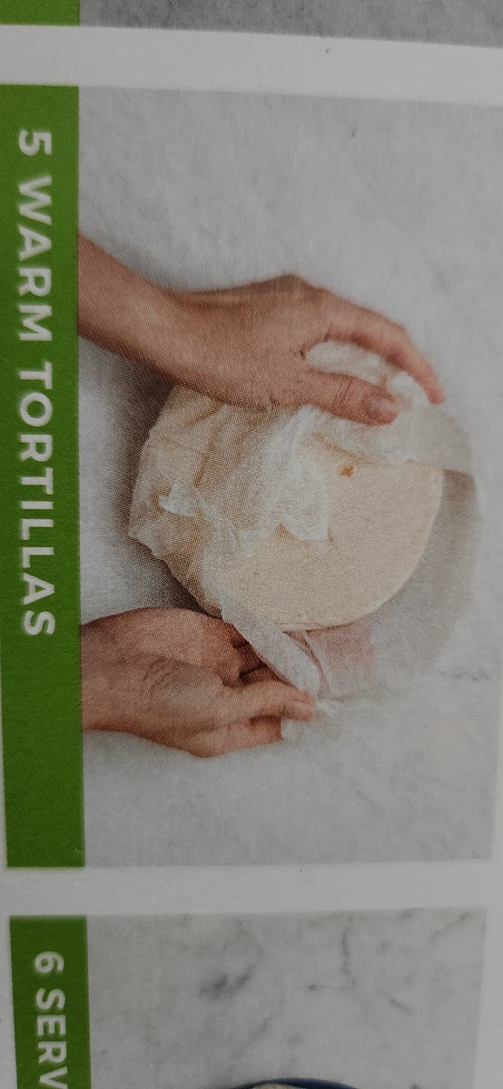 5 WARM TORTILLAS •While pork cooks, wrap tortillas in
damp paper towels and microwave
until warm and pliable, 30 seconds.