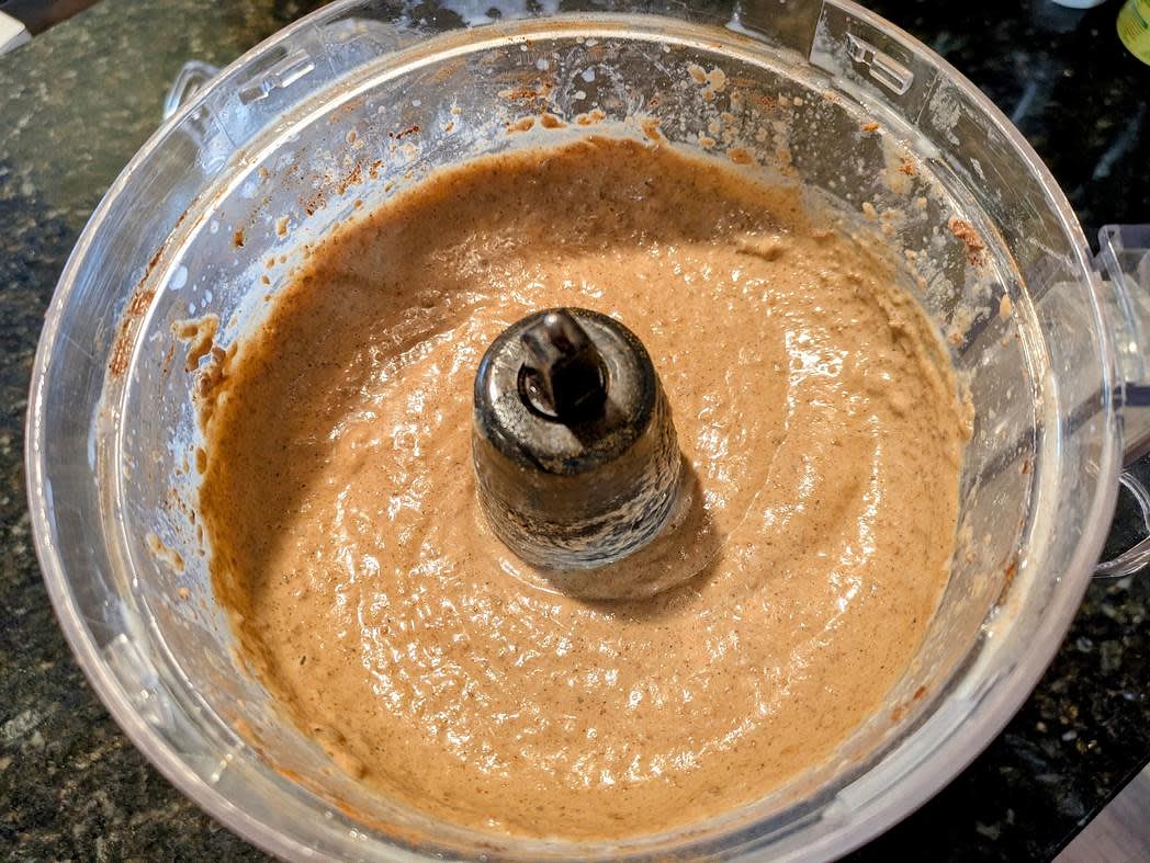 When fully combined, blend in milk, baking soda, and baking powder briefly to combine, but don't over process. Transfer to a large bowl