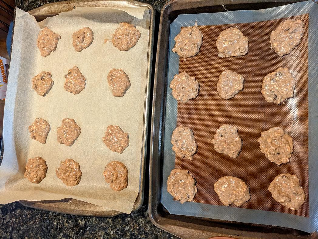 Using spoon, scoop the cookie dough onto to the pan, about 23 g each. These cookies won't flatten or spread as they bake, and will only puff up slightly