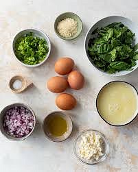 Step 4 In a small bowl, add the spinach (be sure to squeeze all the water out), balsamic, oregano, cottage cheese, feta cheese, eggs, and pepper.