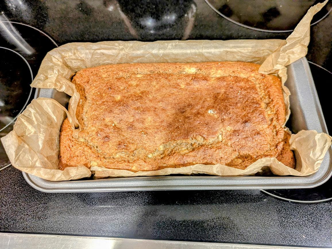 Bake at 350F for about 45 minutes. Without opening the door, turn off the oven, and let sit in there for 5 minutes. The banana bread should be lightly browned, where a toothpick comes out nearly clean and the internal temperature is around 205F