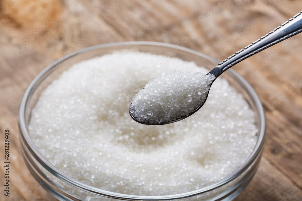 Add the granulated sugar and mix. Continually mix otherwise it will set on the sides...